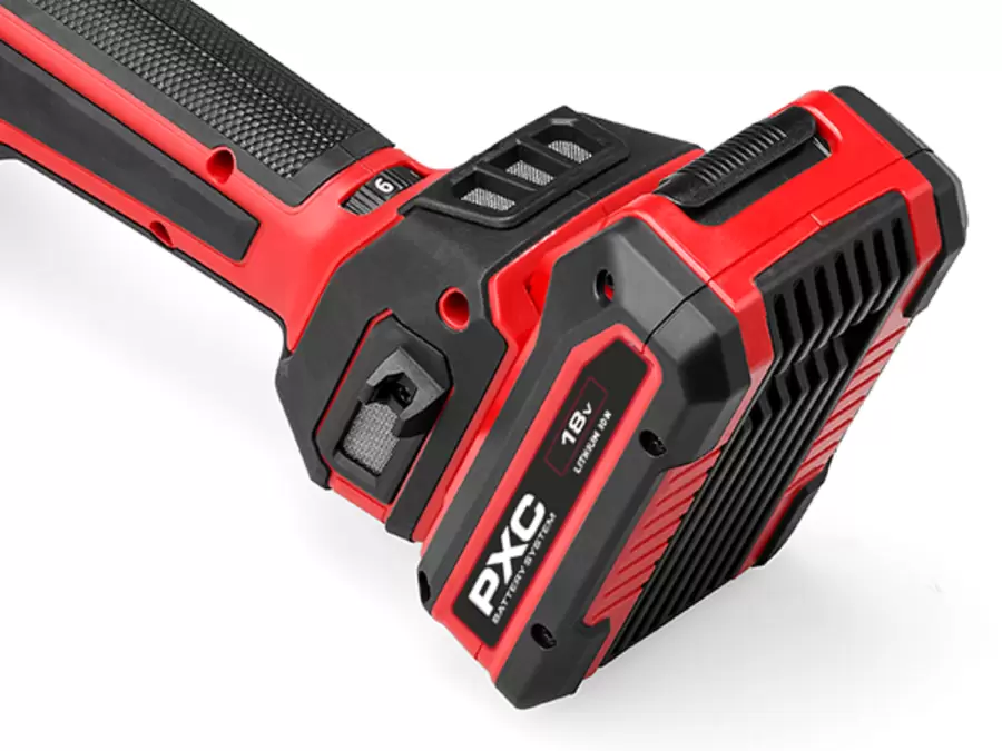 Close-up of the Einhell cordless brush grinder TP-BR 18/32 Li BL - Solo, focusing on the side dust protection grille and inserted battery.