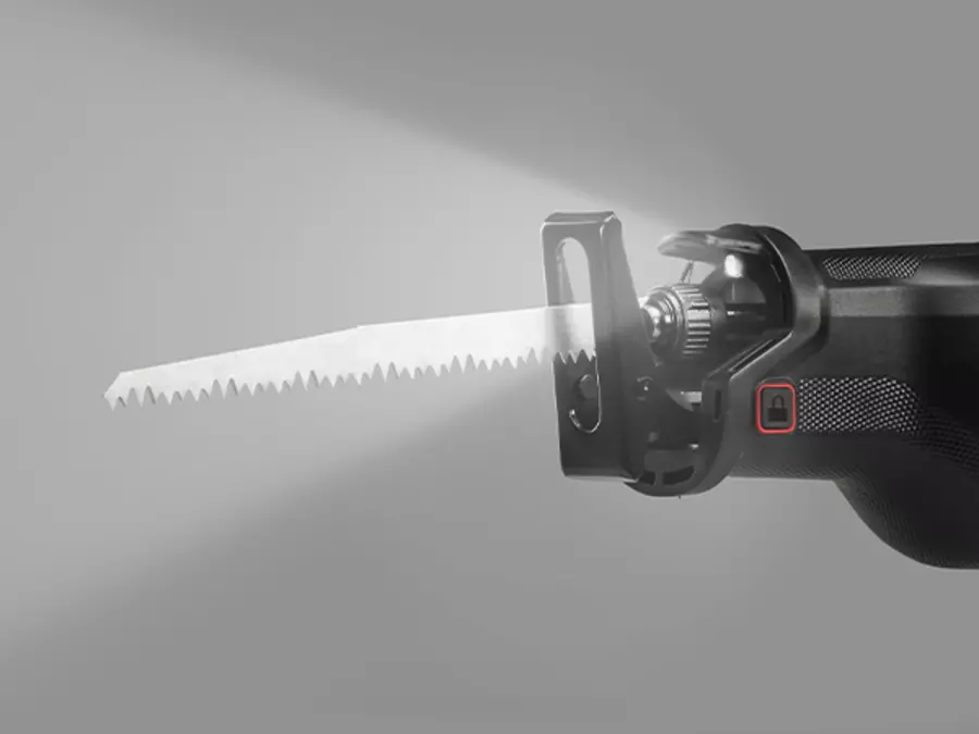 The Einhell cordless universal saw TP-AP 18/32 Li BL - Solo during use, with activated LED light for better visibility.