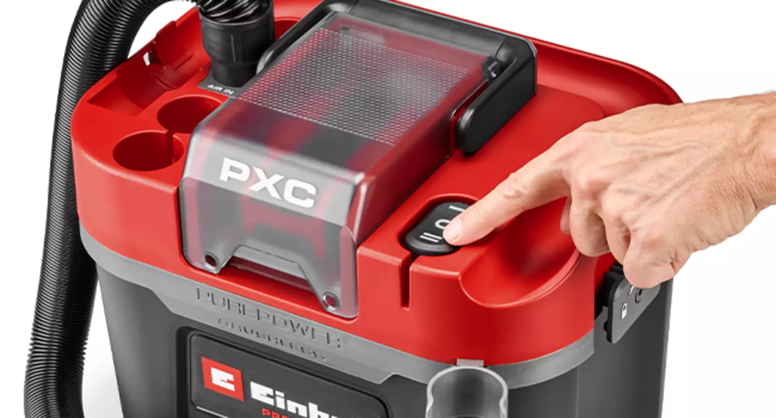 Close-up of the Einhell Cordless Wet/Dry Vacuum Cleaner TP-VC 18/10 Li BL L-Solo; a hand presses the switch for the two operating modes ECO and BOOST.