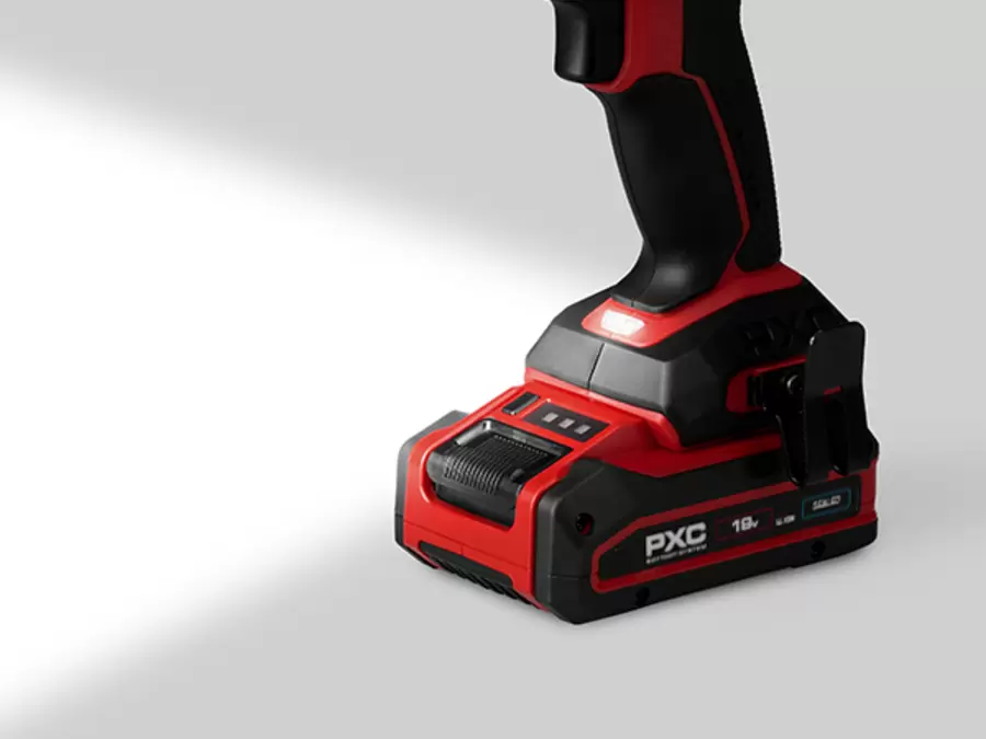 The Einhell Cordless Impact Drill Driver TP-CD 18/70-C Li-i BL - Solo with activated LED light at the base for better illumination.