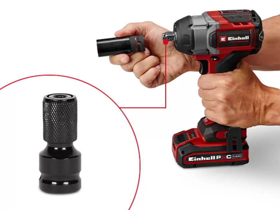 One hand holds the Einhell cordless impact wrench TP-CWD 18/7501-C Li BL +6 S-F, the other hand mounts a socket on the tool head.
