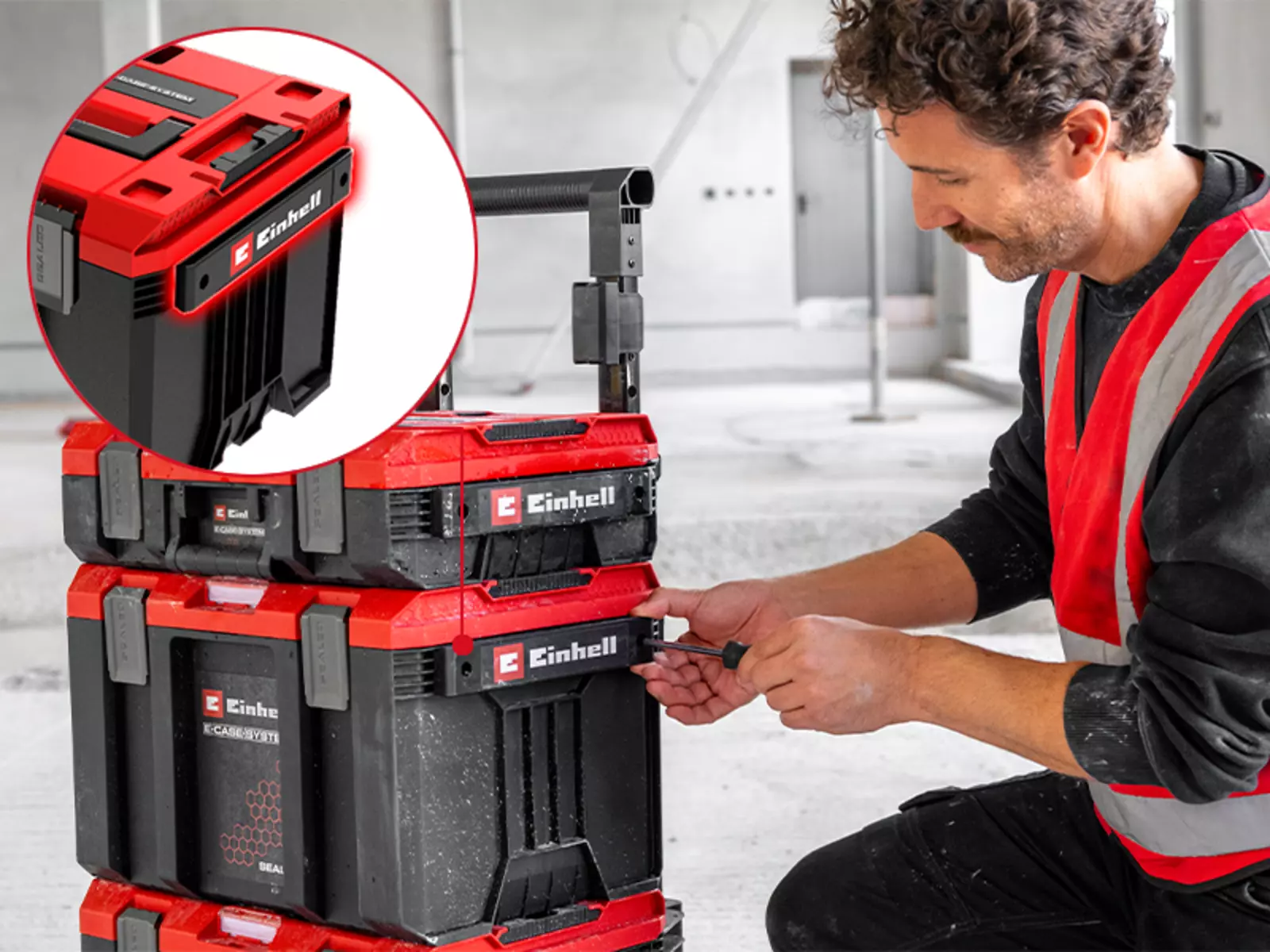 The Einhell E-Case Rolling Workshop SEALED with side rails where accessories are attached by hand.