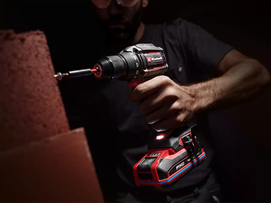 The Einhell Professional cordless drill TP-CD 18/70-C Li BL – Solo in use drilling into a wall.