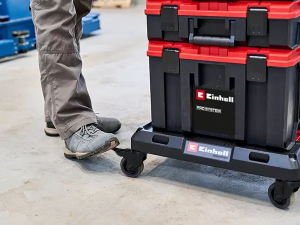 Einhell Pro System Dolly fitted with four wheels, including two lockable wheels with integrated brakes.