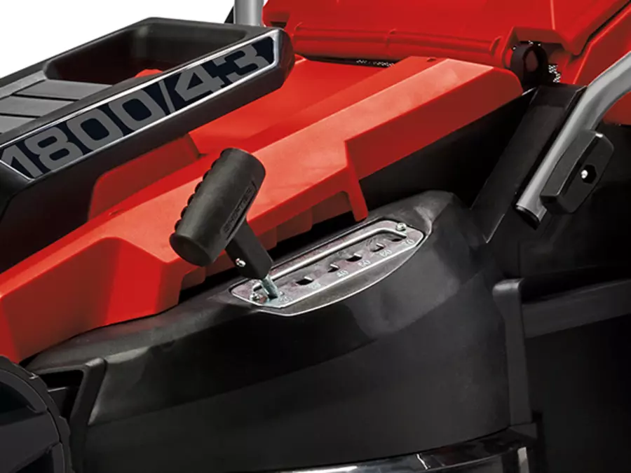 The Einhell electric lawn mower GC-EM 1800/43 with central cutting height adjustment on the housing.