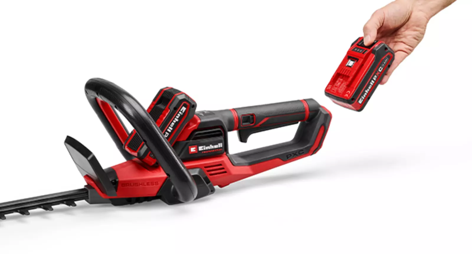 The Twin-Pack battery is being inserted into the Einhell cordless hedge trimmer GP-CH 36/65 Li BL-Solo, shown on a white background.