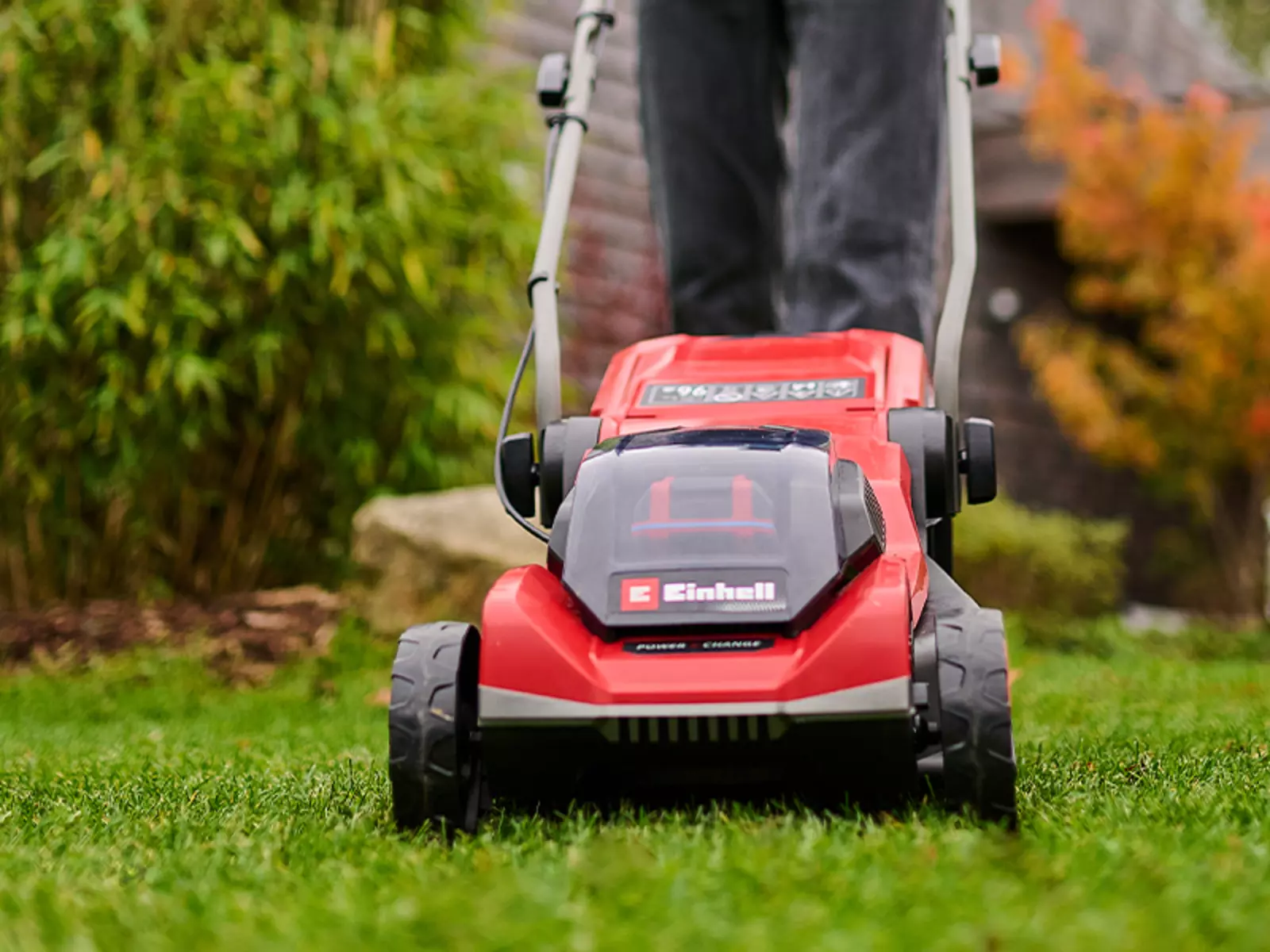 Front view of the Einhell cordless lawn mower GE-CM 18/30-1 Li BL-Solo when mowing a lawn.