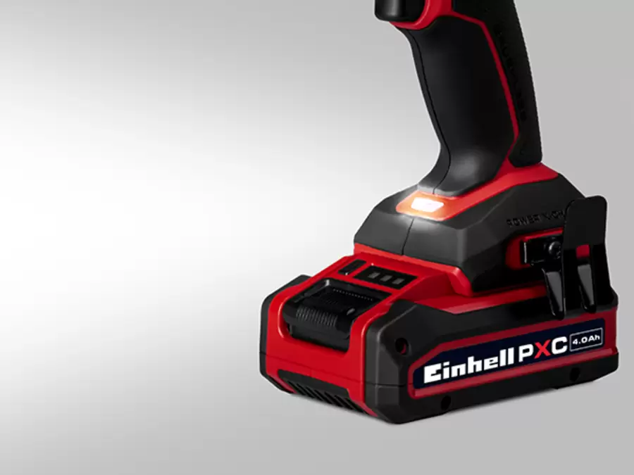 The Einhell cordless impact driver TP-CWD 18/3501-C Li BL with integrated LED light at the base of the device.