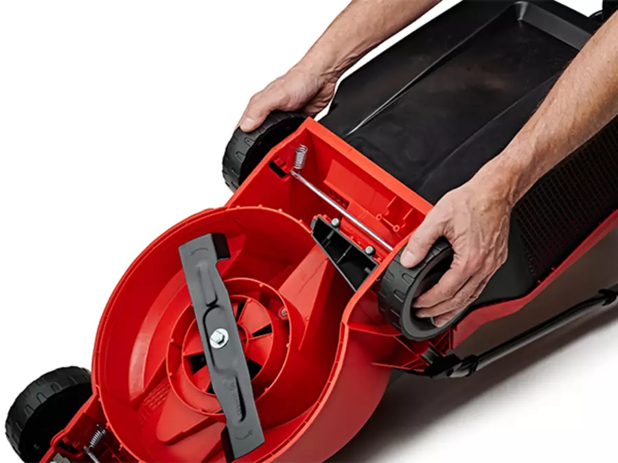 Close-up of the Einhell GE-CM 18/30 Li (1x3.0Ah) cordless lawn mower with cutting height adjustment.
