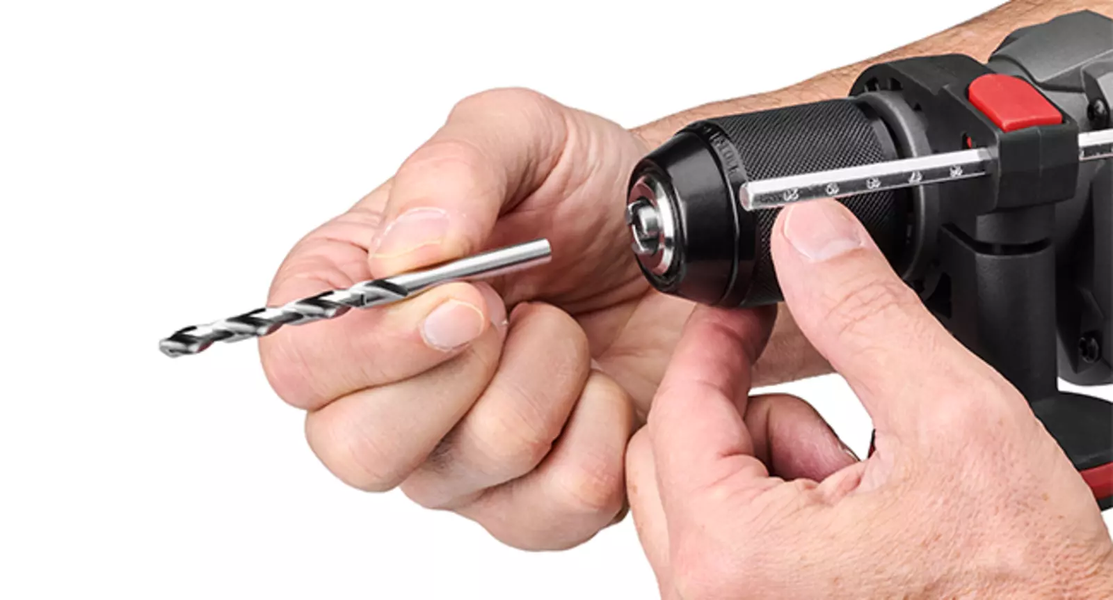Close-up view of the Einhell cordless hammer drill TP-ID 18-C Li BL, featuring a single-sleeve 13 mm metal construction quick-release chuck into which a drill bit is inserted.