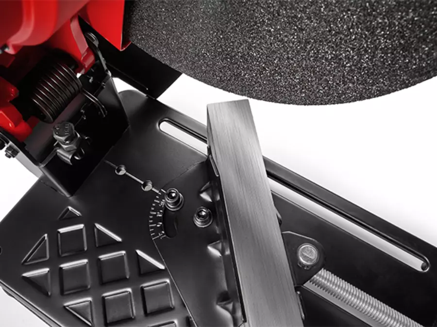 The Einhell metal cutting machine TC-MC 355 with a clamping device for adjusting the angle of the workpiece.