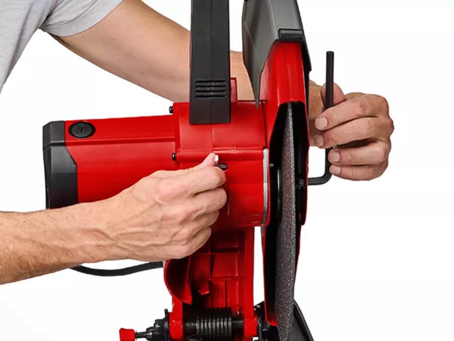 The Einhell metal cutting machine TC-MC 355 during cutting disc change, with the saw blade clamped in place.
