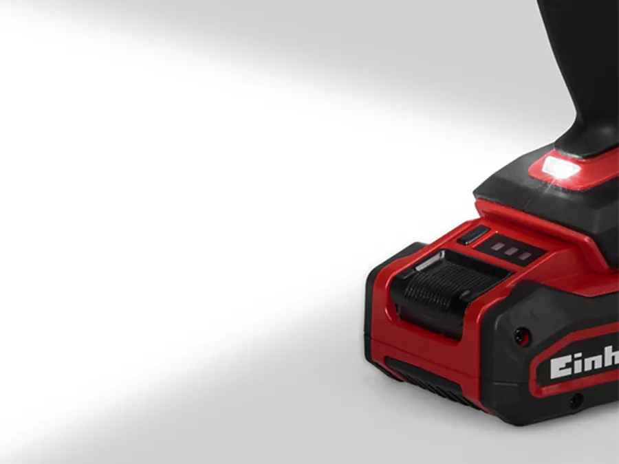 The Einhell cordless drill driver TE-CD 18/50 Li - Solo with LED light switched on at the base.