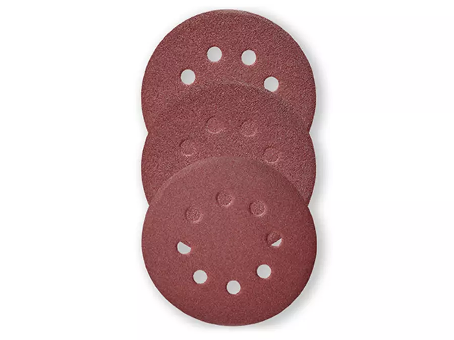 Three round, brown sanding papers with dust extraction holes on a white background.
