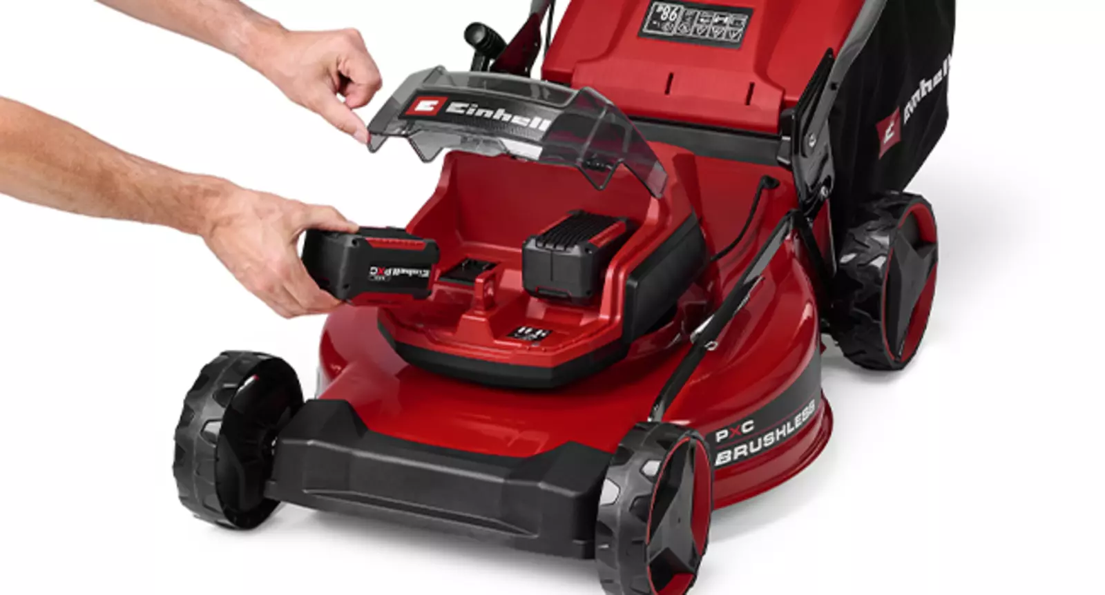 O Einhell corta-relva a bateria GC-CM 36/51 S Li BL (2x5,2Ah) com cobertura de bateria aberta e tecnologia de Twin-Pack visível para 2 baterias.