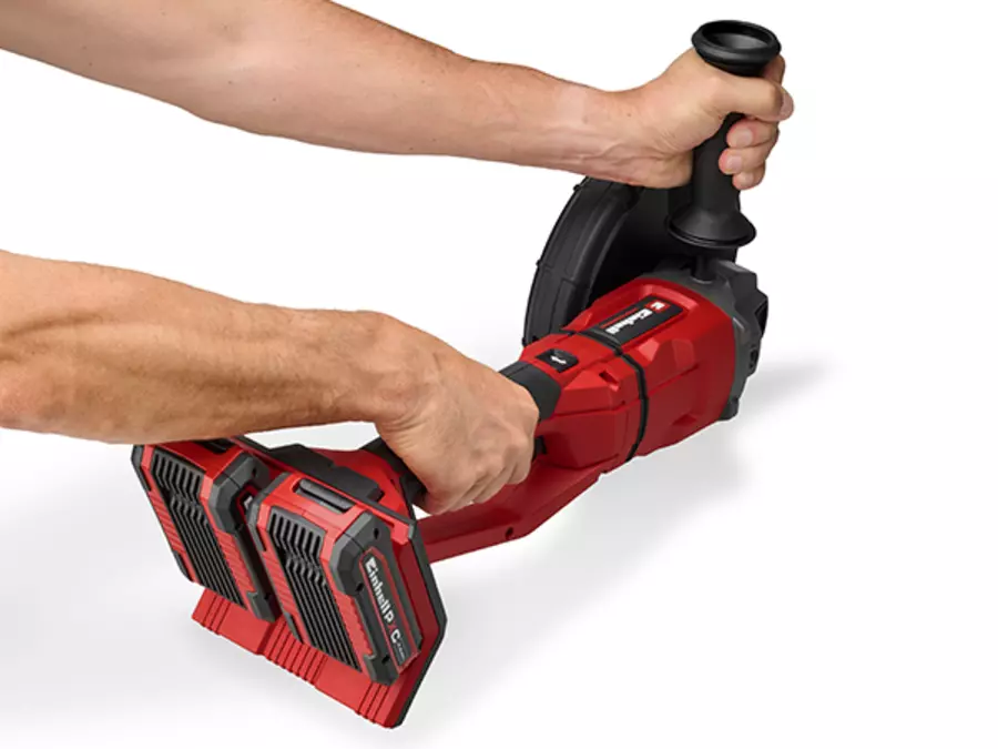 The Einhell Professional cordless angle grinder TP-AG 36/230-22 Li BL with rotated handle and auxiliary handle.
