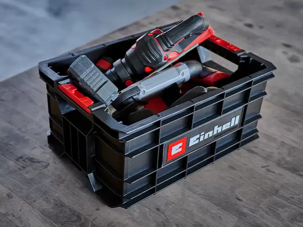 Einhell Pro System Toolbox filled with tools and accessories on a workshop floor.