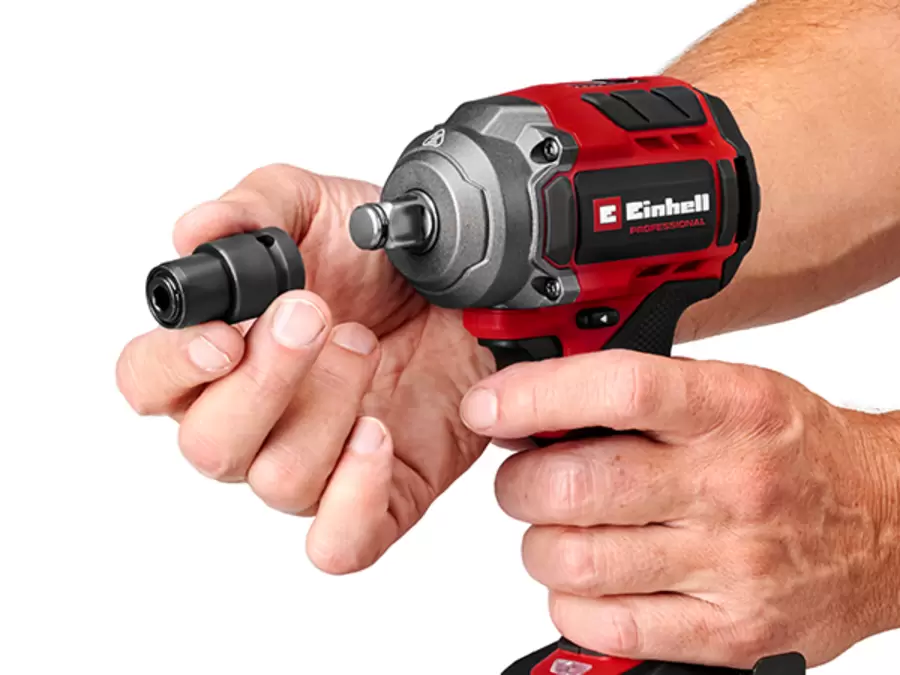 A user places a bit adapter on the Einhell cordless impact drive TP-CWD 18/3501-C Li BL.