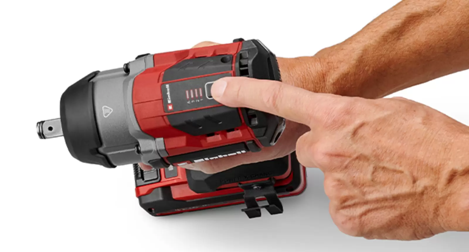 A finger points to the speed control button on the Einhell cordless impact wrench TP-CWD 18/7501-C Li BL +6 S-F.