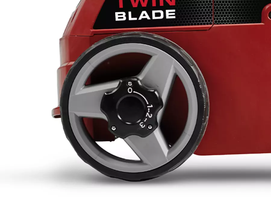 Seitliche Ansicht des Einhell Elektro-Vertikutierer-Lüfters GC-SA 1231/1 mit Symbol zur 3-fachen Arbeitstiefeneinstellung.