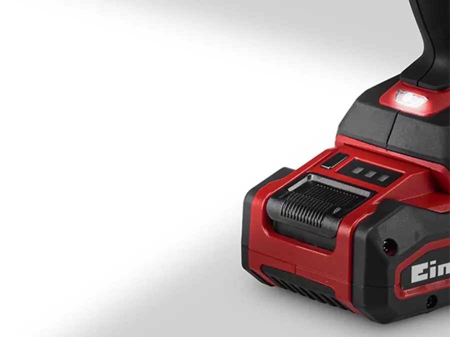 The Einhell Professional cordless impact drill TP-CD 18/50-C Li-i BL (2x3Ah) featuring a detailed view of the integrated, shining LED light on the tool base above the battery on a white background. The text "Einhell" is visible on the battery.