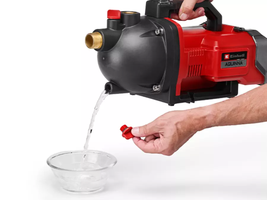 The Einhell cordless garden pump AQUINNA 36/30 Set draining water from the unit for frost protection.