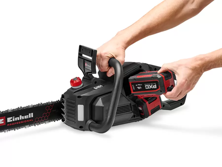 Two hands operating the Einhell Professional 36V Brushless 400mm Chainsaw on a white background.
