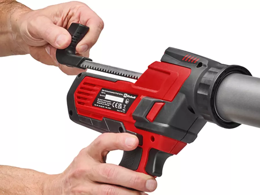 The Einhell cordless cartridge gun TE-SG 18/600 B Li - Solo with a retractable bolt, shown held by one hand.