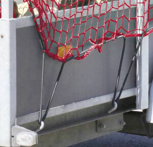 Trailer net in carrier bag