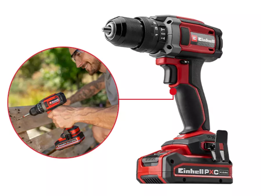 O Einhell berbequim de impacto a bateria TE-CD 18/52 Li-i com perfil e imagem detalhada mostra o design ergonómico em uso.