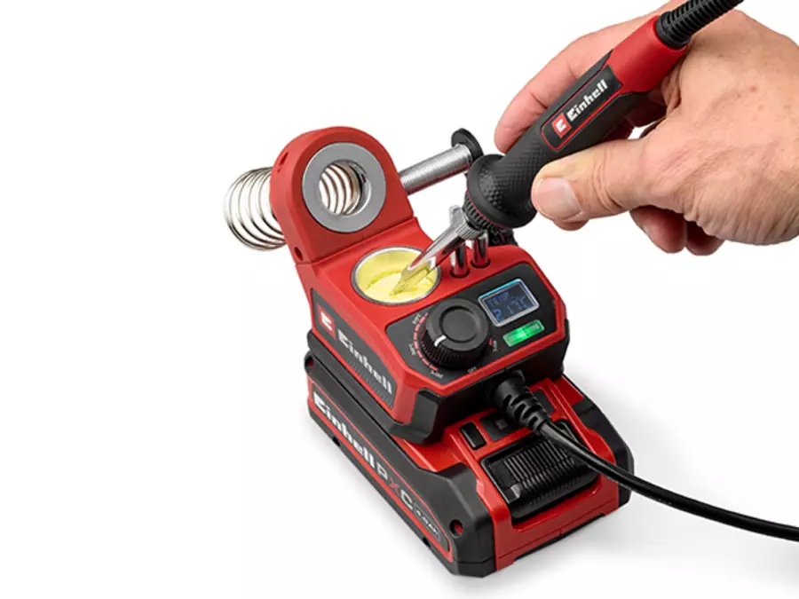 The Einhell cordless soldering iron TE-SI 18/480 Li E - Solo with open sponge container for cleaning the soldering tip.